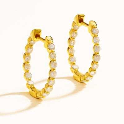 Argollas Diamantesta en Oro Amarillo 18K con diamantes dentro y fuera
