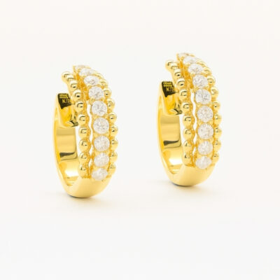 Argolla con borde de bolitas en oro amarillo 18K y centro de brillantes