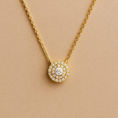 Cadena con dije redondo de brillantes en Amarillo 18k