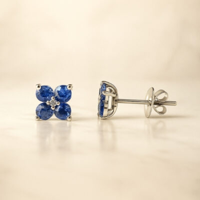 Aretes Biru en Oro Blanco 18k con Zafiros Azules y un Diamante