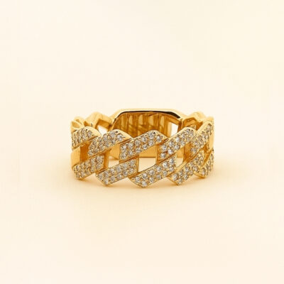 Sortija  con eslabones y brillantes el oro amarillo 18K