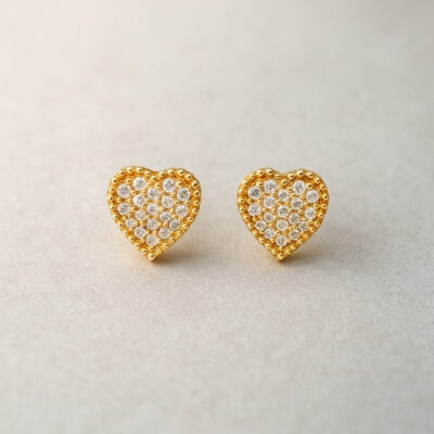 Aretes de corazón con diamantes en Oro amarillo 18K