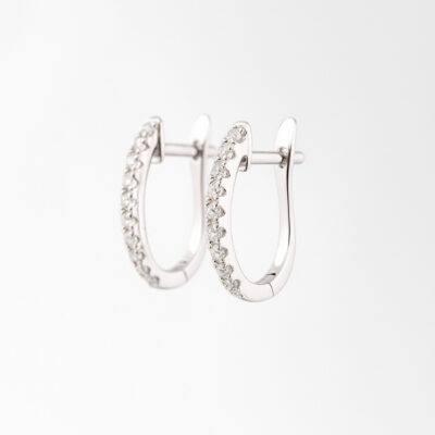 Huggies con Diamantes  en Oro Blanco de 18K.