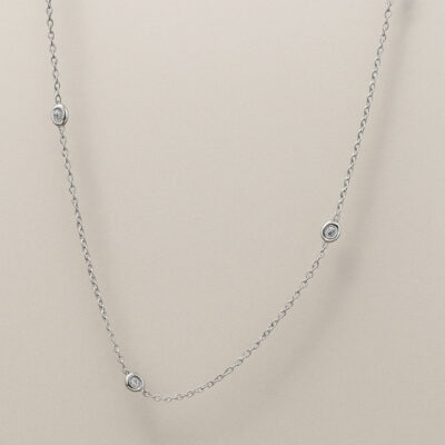 Cadena con Brillantes en Oro Blanco 18K.