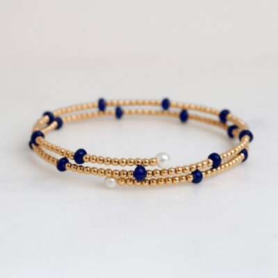 Brazalete de Bolitas elástica con Zafiros en Oro Amarillo 18K.