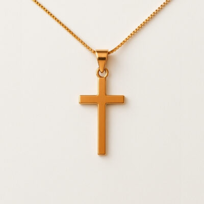 Dije cruz en Oro Rosa 18K.