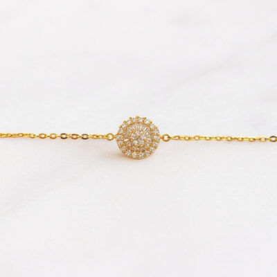 Pulsera con dije Baguettes en Oro Amarillo 18K.
