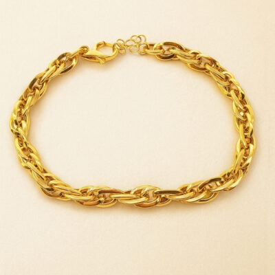 Pulsera  de eslabones ovalados  y cruzados en Oro Amarillo 18k