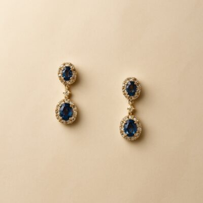 Aretes zafiro ovalados con diamantes en Oro Amarillo 18k