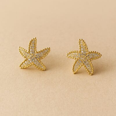 Aretes estrella de mar con diamantes en Oro amarillo 18k