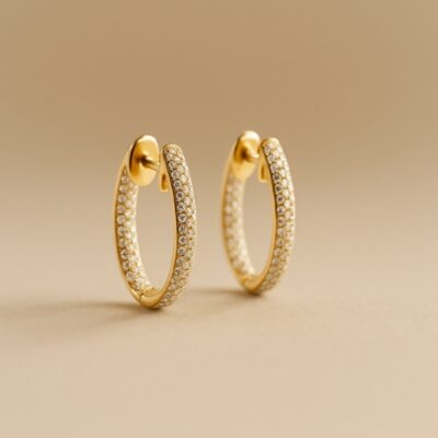 Argollas Ovaladas con diamantes dentro y fuera en Oro amarillo 18k