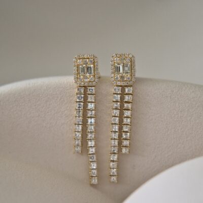 Aretes largos de diamantes  en Oro Amarillo 18k