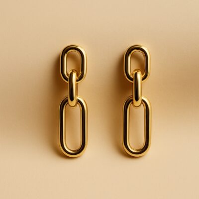 Aretes largos de tres eslabones en Oro Amarillo 18k