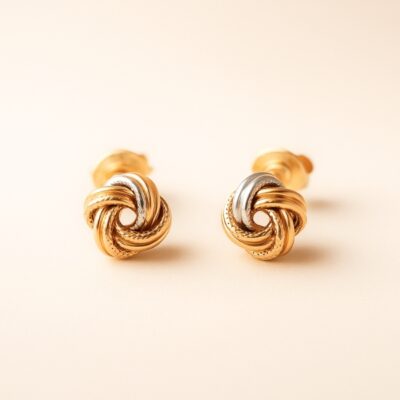 Aretes de nudos en tres oros 18k