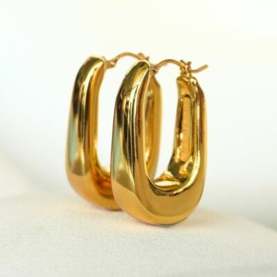 Argollas ovaladas gruesas en oro amarillo 18K