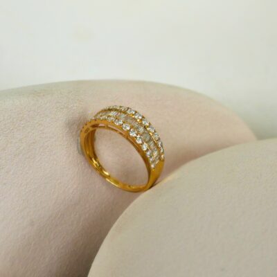 Churumbela de baguettes y brillantes en oro amarillo 18k