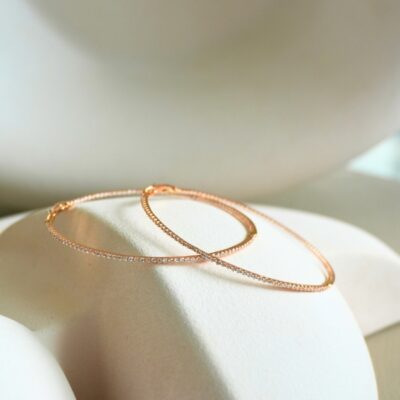 Argollas de diamantes en oro rosa 18k.
